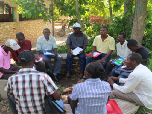 A mother feeding her child.
